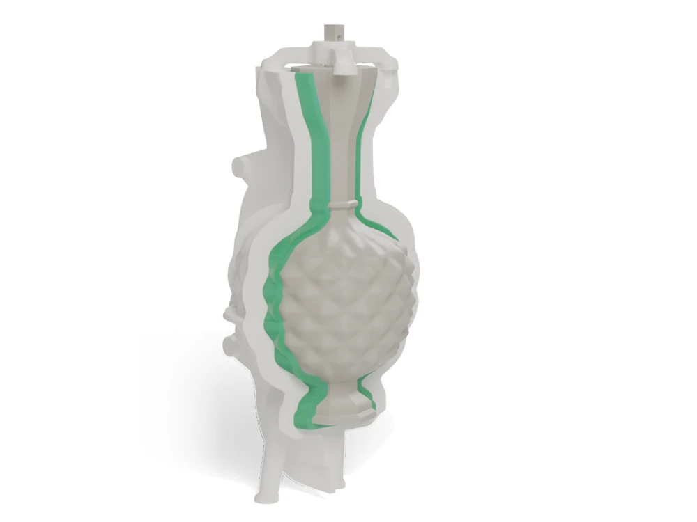 The kit cut open: the printed case, then a green layer that shows the space the silicone fills, then the printed copy of the urn with its diamond points